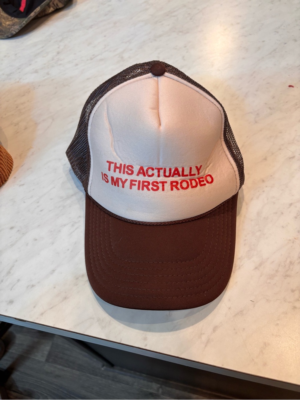 Brown and Cream Trucker Hat with Red Slogan